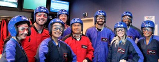 Group of people geared up at iFLY