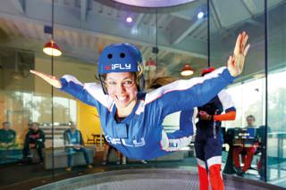 Woman flying at iFLY