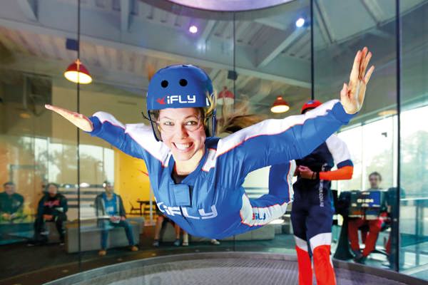 Woman flying at iFLY