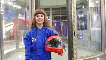 Woman geared up at iFLY 2