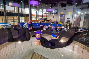 Two people flying at iFLY 3