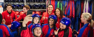 Group of people at iFLY taking selfies