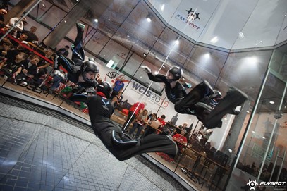 Two people flying at iFLY 4