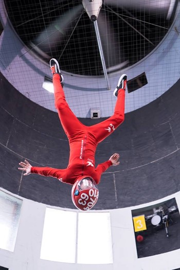 Person flying at iFLY 9